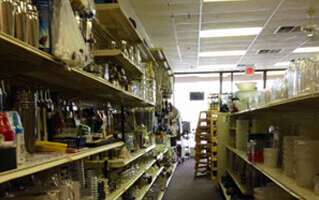 An aisle of small restaurant supplies at Skelton's Inc.